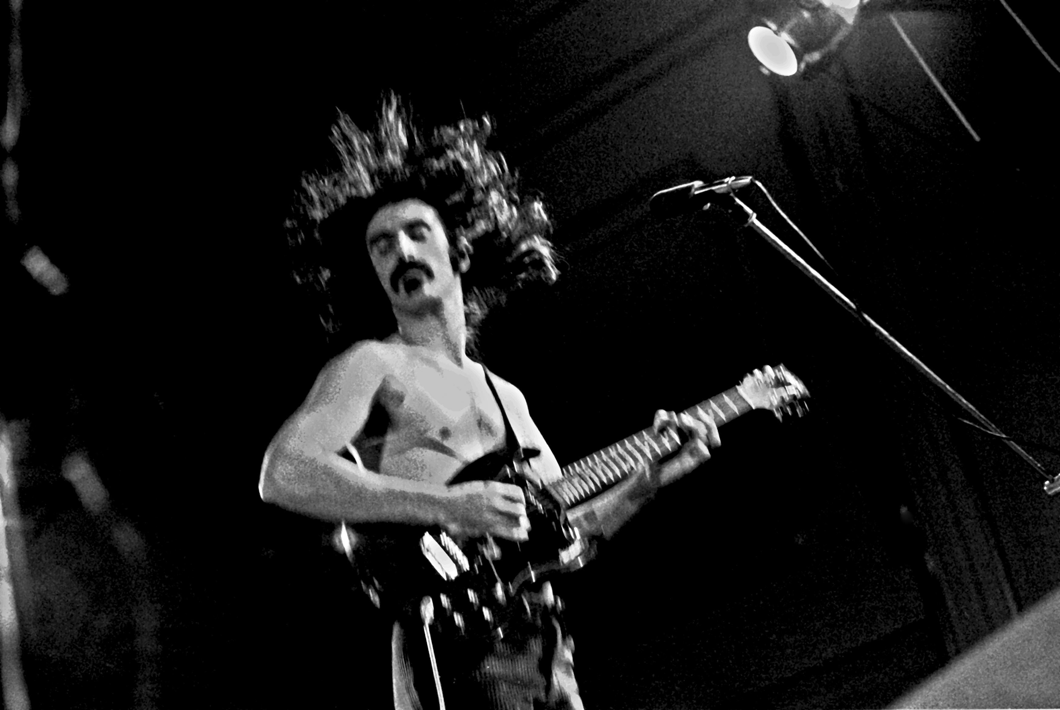 Frank Zappa playing his guitar